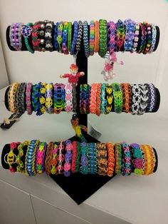 there are many bracelets on display together