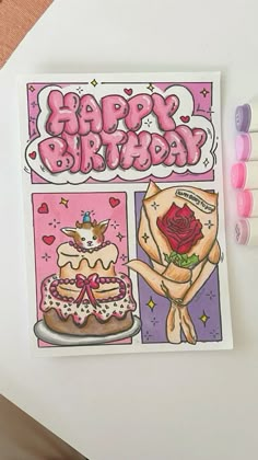 a happy birthday card with two cakes and candles on the table next to some markers