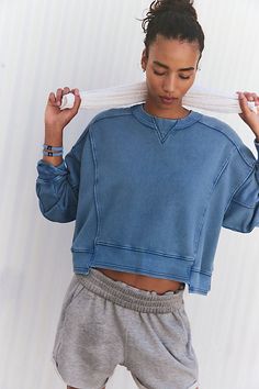 So essential and made to wear everywhere, this classic sweatshirt is featured in a slightly cropped length and boxy fit with seam detailing throughout. **Fit:** Boxy, relaxed fit, slightly cropped **Features:** Soft fabrication, pullover style, classic crew neckline, drop shoulder sleeves **Why We | Intercept Pullover by FP Movement at Free People, Blue Grey, L Free People Fashion, Junior Girl Dresses, Free People Activewear, Bohemian Style Clothing, Active Wear Shorts, Fp Movement, Dresses Kids Girl, Grey Women, Skirted Swimwear