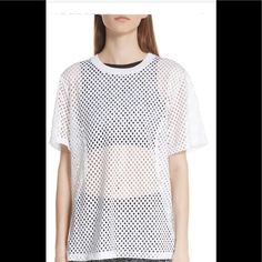 A Loose-Fitting Tee Cut From Unlined And Ventilated Mesh Exudes Unapologetically Bold And Sporty Style. 28" Length (Size Medium) Crewneck Short Sleeves Sheer; Base Layer Recommended 100% Polyester Machine Wash, Line Dry Made In Portugal White Stretch Mesh Top With Crew Neck, White Crew Neck Mesh Top, White Athleisure Tops For Spring, Mesh T Shirt, Opening Ceremony, Sporty Style, Base Layer, Portugal, Loose Fitting