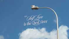 a street light with the words off love is the best love on it's side