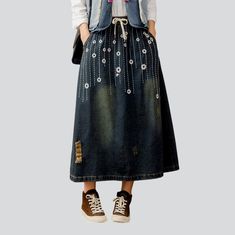 Welcome to our 2023 Spring-Summer Collection with a fashion laid-back embroidery long denim skirt. This high-waist, drawstrings closure skirt is the perfect blend of laid-back style and enduring sophistication. With its unique embroidery pattern, it's sure to make a statement!Key Highlights: Urban Embroidery: Crafted with intricate embroidery detailing, this skirt offers an effortless expression of vogue style. Long Length: The elongated length of this skirt offers a flattering silhouette, perfe