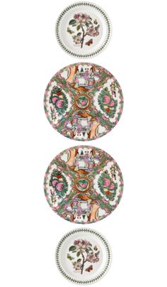 three plates with floral designs on them