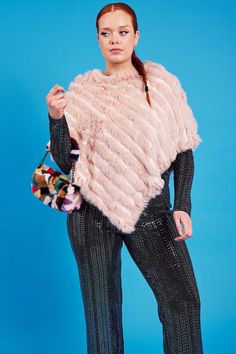 This is a faux fur poncho.   Main 70% Modacrylic 30% Acrylic   Base 10% Cashmere 45% Cotton 45% Modacrylic  Size  Model Height: 5'8   Model Size: 8   Model Wearing: One Size Fur Poncho, Base 10, Pink Faux Fur, Poncho Cape, Fashion Face, Ponchos, Model Height, Faux Fur, Cashmere