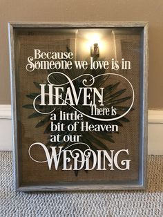 a framed sign that reads because someone we love is in heaven, a little bit of heaven at our wedding