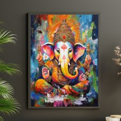 an elephant painting is hanging on the wall next to a potted plant and vase