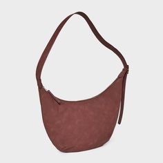 Bring a chic finishing touch to your everyday or dressy outfits with this Slouchy Crescent Sling Handbag from Universal Thread™. This unstructured handbag features a single zipper compartment to carry your phone, wallet, makeup essentials and other items. Plus, it has an interior zip pocket for any additional space you need. Designed in crescent shape and featuring a faux-suede finish in a solid hue, this handbag features an adjustable belt strap that make carrying it convenient and comfortable. Versatile Hobo Bag With Cell Phone Pocket, Versatile Hobo Shoulder Bag With Cell Phone Pocket, Hobo Bag With Cell Phone Pocket For On-the-go, Chic Everyday Hobo Bag With Cell Phone Pocket, Chic Hobo Bag With Cell Phone Pocket, Modern Hobo Bag With Zipper Closure For Everyday Use, Modern Hobo Bag With Zipper For Everyday Use, Chic Hobo Bag With Cell Phone Pocket For Travel, Modern Bag With Cell Phone Pocket