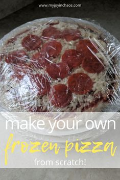 a homemade pizza is wrapped in plastic and ready to be eaten with the words make your own frozen pizza from scratch