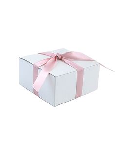 a white box with a pink ribbon on the top and bottom, sitting in front of a white background