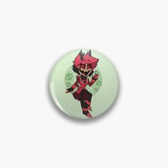 a button with an image of a demon on it