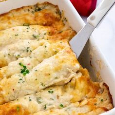 a casserole dish with meat and cheese in it, ready to be eaten