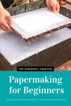 a book cover with the title papermaking for beginners, and two hands on top of