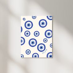 a blue and white square with circles on it