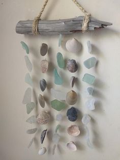 sea glass and driftwood hanging on the wall