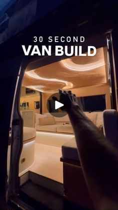 there is a man that is opening the door of a van to see what's inside