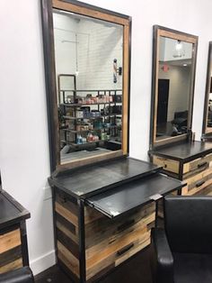 a hair salon with chairs and mirrors