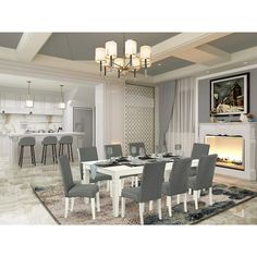 a dining room table with grey chairs and a fireplace in the backround area