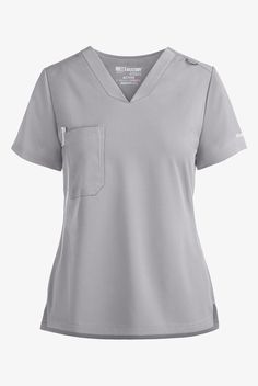 A classic, professional look with updated design features, the Grey s Anatomy™ by Barco Spandex Stretch Active Tuck In Scrub Top is a huge favorite. Each style in the Grey’s Anatomy™ by Barco Spandex-Stretch collection has a modern, athletic-inspired fit. Experience the unrivaled flexibility and all-day comfort of our moisture-wicking, soil-resistant fabric. • Modern fit • V-neck with rib-knit trim • 1 right chest pocket with pen slot • Short sleeve • Shoulder yoke with bungee ID loop on left • Scrub Shirt, Cargo Scrub Pants, Flexible Stretches, Uniform Advantage, Easy Stretches, Medical Uniforms, Scrub Pants, Professional Look, Scrub Tops