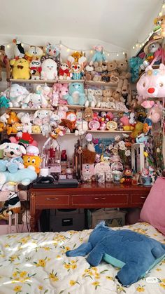 a room filled with lots of stuffed animals on top of a wooden dresser next to a bed