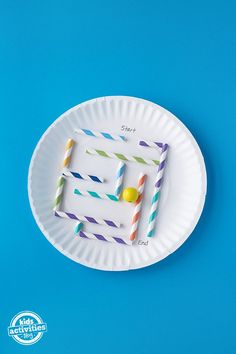 a paper plate that has some straws on it