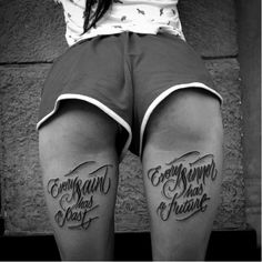 two women's legs with words on them