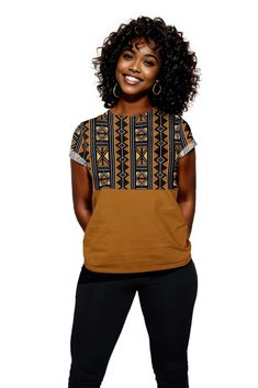 This Mixed African Tribal Print Women T-shirt is a stylish addition to your wardrobe. Made from high-quality fabric, it features a unique mix of vibrant tribal prints that offer a one-of-a-kind look. Perfect for any occasion, this shirt is comfortable and full of character. Product Features Please Compare your Measurements To our Size Chart This T-shirt is Designed for fashionable women. Made from 5.47 Oz. 100% polyester. Double-needle hemmed sleeves and bottom. Vivid print that will never fade Indoor Outdoor Bathroom, Outdoor Bathrooms, Canvas Decor, Skirt Leggings, Women T Shirt, Product Features, One Piece Swimsuit, Shirt Blouses, Quality Fabric