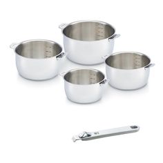 four stainless steel pans with handles and lids on a white background next to a knife