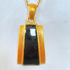 Lia Sophia Pendant Necklace, Black and Gold Pendant,  23 Inch Chain, Classic Necklace, Vintage Lia Sophia Jewelry Lovely vintage Lia Sophia pendant necklace in a matte gold and enamel.   The pendant is 1 3/4" x 3/4" .  Signed Lia Sophia.  The chain is 23".  Wonderful vintage condition.   More Pendants https://www.etsy.com/shop/VintageVogueTreasure?ref=hdr&search_query=pendants Formal Black Enamel Pendant Necklace, Formal Hallmarked Necklace With Rectangular Pendant, Black Enamel Pendant Necklace For Evening, Gold Rectangular Necklace For Evening, Rectangular Gold Necklace For Evening, Formal Metal Necklace With Rectangular Pendant, Black Pendant Necklace In Costume Jewelry Style, Black Pendant Necklace Costume Jewelry, Black Pendant Costume Jewelry Necklace