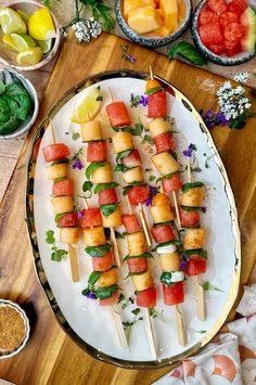 watermelon and lemon skewers on a platter