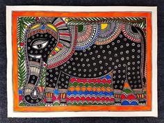 an intricately painted elephant on a black background