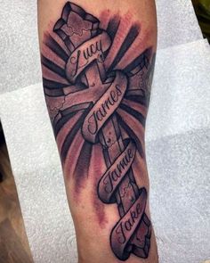 a cross with some words on it and the word jesus written in cursive font