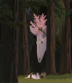 two people are standing in the woods near a giant animal head with pink flowers on it's head