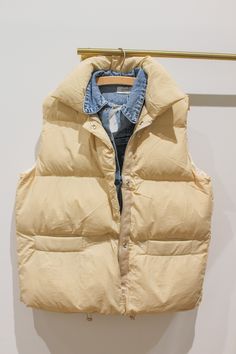 Stay warm and stylish with our Sandstone Puffer Vest. Featuring a trendy padded design, denim layered button-up front, and high collar, this vest adds a touch of edge to any outfit. With a relaxed fit and zip-up closure, it's perfect for layering. Puffer Vest Yellow, Puffer Vest Outfit, Padded Vest, Quilted Puffer Vest, Fall Capsule Wardrobe, Vest Outfits, Midi Maxi Dress, Jogger Sweatpants, Short Jumpsuit