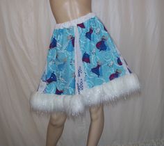 "This skirt is ready to ship, same day if purchased earlyplease read on for sizing info.    This is a 100% cotton patchworked skirt with vignettes of your favorite scenes from the cartoon all over it.... the sweet little animals from the original cartoon alongthat makes it fun and an added hemline of white tinsel sparkle faux fur for extra fluff, fun and attention getting perfectness!  I am so delighted to offer this funky fun skirt, in a full swing and mini lengthin my opinion there is way to m Modern Christmas Party, Burl Ives, White Tinsel, Disney Olaf, Unique Skirt, Unique Skirts, Sparkle Skirt, Little Animals, Ugly Sweater Party