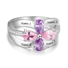 Sterling Silver 4 Birthstone Ring is a triple-layered ring with small silver stones embedded in the center layer, it also has four birthstones in the center in the shape of a flower and it can be personalized by engraving four names on it along with a message inside the ring making it an ideal gift for family or for a group of friends. Features: Color: Silver Material: Silver Style: Personalized Size: Available Size: US - 6/7/8/9 Weight: 4g Mothers Ring 3 Stone Sterling Silver, Luxury Three Stone Birthstone Promise Ring, Luxury Three Stone Birthstone Ring, Cheap Sterling Silver Birthstone Ring As A Gift, Luxury Three Stone Birthstone Ring For Formal Occasions, Mothers Ring 6 Stones, Sister Rings For 4, Luxury Gift Birthstone Ring With Round Band, Luxury Round Birthstone Ring For Gift