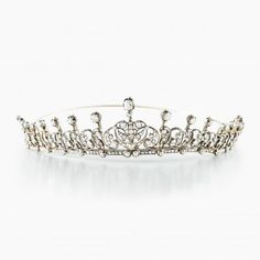 A delicate diamond tiara, with outward curling foliate scrolls on either side of a slightly larger central motif. Wedding Tiaras, 13 December, Tiara Headpieces, Chanel Earrings