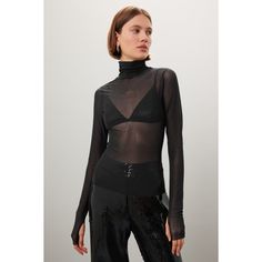 Black mesh (95% polyester, 5% spandex). Top. Long sleeves. Mock neck. Pull on. 23" from shoulder to hemline. Imported. Mesh Turtleneck, Spandex Top, Rent The Runway, Turtleneck Top, Closet Designs, Turtle Neck Top, Black Mesh, Polished Look, Layered Necklaces