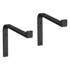 two black metal brackets on a white background