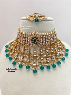 Elegant Kundan Choker comes with Jhumki Earrings and Tikka/ Indian Jewelry/Unique Polki and Kundan Jewelry/peacock rama Green morepankhia    All items are shipped from Brampton, Ontario, Canada. If you need your item by a certain day, please reach out to us for express delivery option before placing the order so that we can update the shipping for you. Standard shipping/delivery timeline Below are the delivery timeline estimates. We dispatch all orders by the next business day. ---> USA delivery timeline * 3-5 business days to major urban centers in USA. It may take 1-2 days extra to remote locations ---> Canada delivery timeline  * 2-3 business days - GTA  & Montreal  * 2-4  business days - Rest of Ontario/Quebec * 2-6 business days-  Rest of Canada    ---> Europe/Middle East timeline * 5 Green Kundan Jewelry With Peacock Design, Green Bollywood Jewelry With Peacock Design, Traditional Turquoise Jewelry Sets For Wedding, Bollywood Style Green Peacock Design Jewelry, Festive Turquoise Bridal Necklace For Wedding, Festive Turquoise Bridal Necklace, Green Kundan Ceremonial Sets, Festive Turquoise Kundan Necklace For Wedding, Ceremonial Green Kundan Bridal Sets