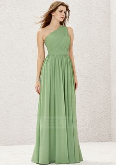 a woman in a long green dress