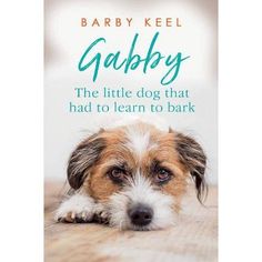 the book cover for baby keel's garbby, with a dog laying on