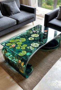 a glass coffee table with water lilies on it