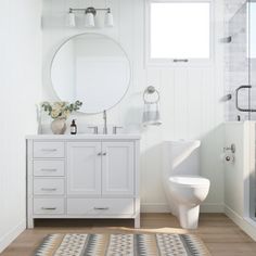 a bathroom with a sink, toilet and shower in it's white color scheme