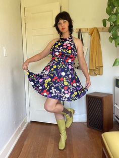 Guys I'm totally obsessed with this 1970s floral open back halter dress. The brand is Sears, it's made of 100% nylon and it looks to never have been worn. The waist is 15.5" and stretches up the 17". The bust and hips are pretty open, and the length is adjustable based on how tight you tie the halter. Fitted Retro Sleeveless Halter Dress, Fitted Floral Print Halter Dress For Garden Party, Fitted Retro Summer Halter Dress, Retro Spring Halter Dress, Fitted Retro Halter Dress For Summer, Retro Halter Neck Dress For Spring, Fitted Multicolor Halter Dress For Spring, Retro Fitted Halter Dress For Spring, Fitted Retro Halter Dress For Spring