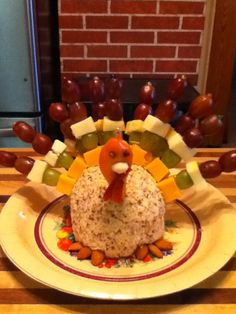 a turkey made out of rice sitting on top of a plate