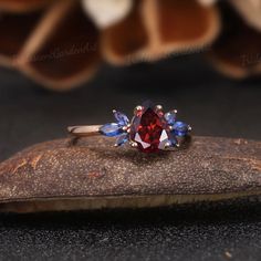 Vintage Garnet Engagement Ring Art Deco Wings Shaped Sapphire | Etsy Garnet And Topaz Ring, Sapphire Ruby Ring, Garnet Gold Engagement Ring, Ruby Sapphire Engagement Ring, Sapphire And Garnet Ring, Gemstone Wedding Rings Unique, Garnet And Alexandrite Ring, Red And Blue Wedding Ring, Ruby And Blue Sapphire Ring