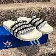 Brand New In The Box And Authentic Item. Black Synthetic Slides With Woven Sole, White Textured Sole Slip-on Slides, Casual White Slides With Woven Sole, White Comfortable Adidas Slides, Black Slides With Woven Sole, Black Woven Sole Slip-on Slides, White Non-slip Adidas Slides, Comfortable White Adidas Sandals, White Adidas Slip-on Sandals