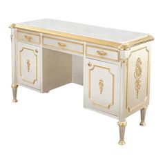 a white desk with gold trimmings on the top and bottom, in front of a white background