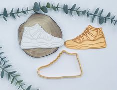 two cookie cutters and a pair of sneakers