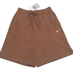 "New With Tags" Breathable, Comfort, Elastic Waist, Pockets, Stretch Waist-26" Inseam-6 1/4" 80% Cotton And 20% Polyester Shell Brown Shorts For Streetwear In Spring, Brown Shorts For Spring Streetwear, Brown Athleisure Shorts, Brown Athleisure Short Bottoms, Brown Streetwear Shorts, Sporty Brown Shorts For Spring, Sporty Brown Bottoms For Spring, Nike Brown Sports Bottoms, Trendy Nike Shorts